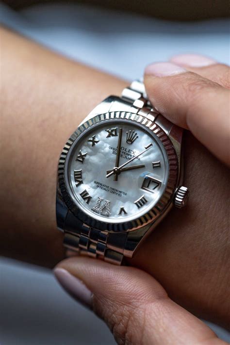 rolex black mother of pearl datejust|rolex 31mm datejust diamond bezel.